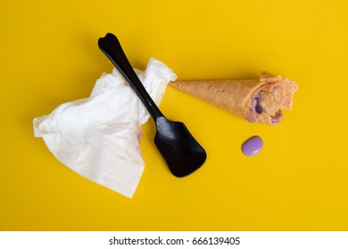 Homemade Ice Cream In Broken Waffle Cone With Wafer Crumb Over Yellow Background. 