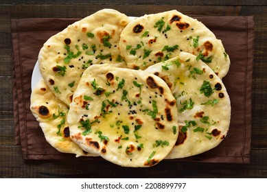 Homemade indian naan bread. Top view, flat lay.  - Shutterstock ID 2208899797