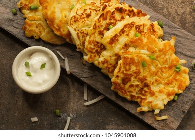 Homemade Irish Potato Pancakes (Boxty) / St.Patrick Day Food / Latkes Served With Sour Cream Dip Top View