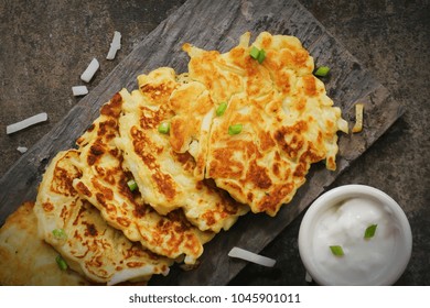 Homemade Irish Potato Pancakes (Boxty) / St.Patrick Day Food / Latkes Served With Sour Cream Dip Top View