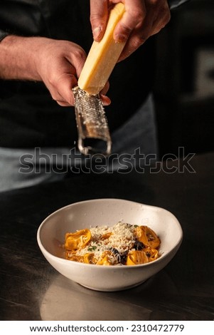 Homemade italian ravioli pasta with meat and cheese filling,