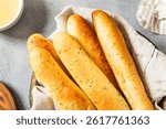 Homemade Italian Soft Garlic Breadsticks with Butter and Salt