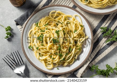 Homemade Italian Spaghetti Algio e Olio with Garlic and Parmesan