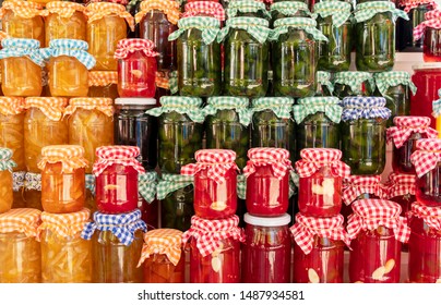 Homemade Jam For Sale At A Farmer's Market. Colorful Jam Jars. 