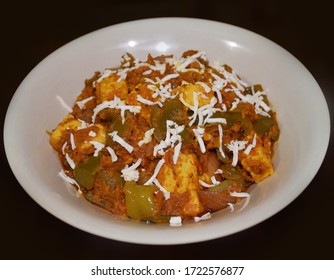 Homemade Kadhai Paneer Or Cottage Cheese Dish On A White Bowl. It Is A Traditional North Indian Dish