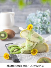 Homemade Kiwi Banana Sorbet With Spring Flowers On The Kitchen Table