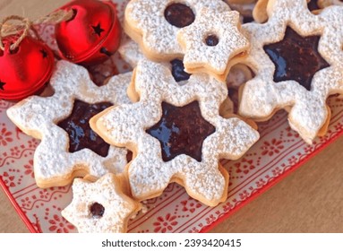 Homemade Linzer cookies sprinkled with icing sugar