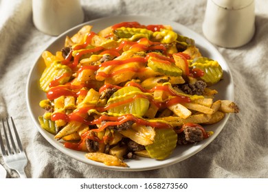 Homemade Loaded Cheeseburger Cheese Fries With PIckles And Ketchup