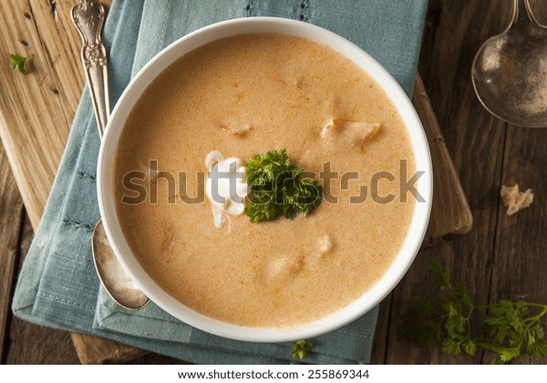 Homemade\
Lobster Bisque Soup with Cream and\
Parsley