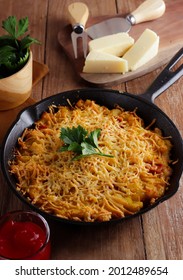 Homemade Macaroni And Cheese For Kids. Made From Macaroni And Shredded Cheese, Served On Cast Iron.