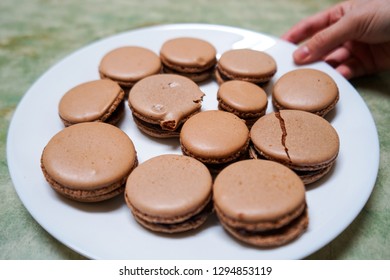 Homemade Macarons On A White Plate, Made By An Amateur Baker. 