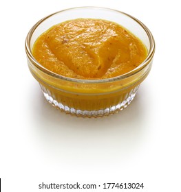 homemade mango amba sauce, israeli condiment isolated on white background