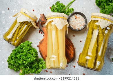 Homemade marinated asparagus in a glass jar. Food supplies. Top view. - Powered by Shutterstock