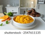 Homemade mashed potatoes with pumpkin on kitchen counter