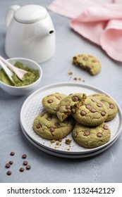 Homemade Matcha And Chocolate Chip Cookies On Light Concrete Background