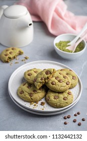 Homemade Matcha And Chocolate Chip Cookies On Light Concrete Background