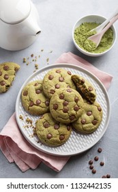 Homemade Matcha And Chocolate Chip Cookies On Light Concrete Background