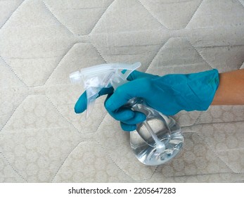 Homemade Mattress Cleaner Spray Against The Backdrop Of Fabric . Cleaning A Mattress Cloth With Vinegar. Copy Space.