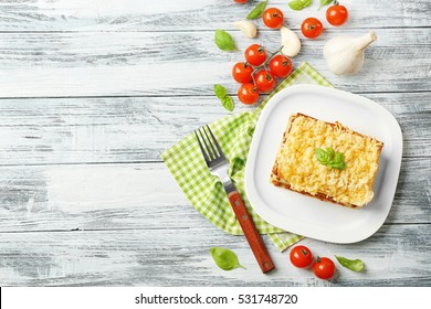 Homemade Meat Lasagna On Wooden Table