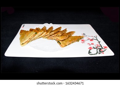 Homemade Meat Pie On White Square Plate With Black Background.