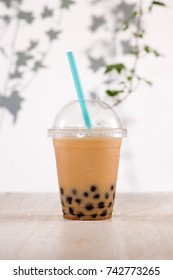 Homemade Milk Bubble Tea In Plastic Cups On Table.