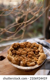 Homemade Mini Apple Crumble Pie In Window Sill