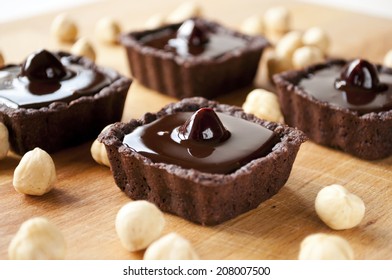 homemade mini tarts with chocolate and nut