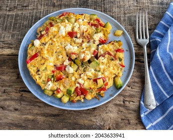 Homemade Mixed Veggie And Cheese Omelet On The Table For Breakfast