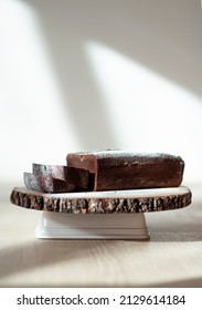 Homemade Moist Chocolate Cake On A Cake Stand