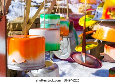 Homemade Musical Instruments From Metal Basins And Pans. Handmade - Unique Colorized Kitchenware, Adapted As A Folk Percussion Instrument. Folk Art Outdoors. Funny Nicholas Fortress, Russia