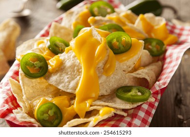 Homemade Nachos With Cheddar Cheese And Jalapenos