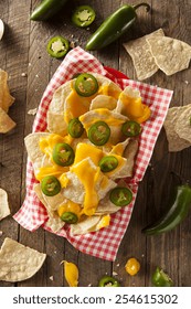 Homemade Nachos With Cheddar Cheese And Jalapenos