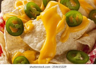 Homemade Nachos With Cheddar Cheese And Jalapenos