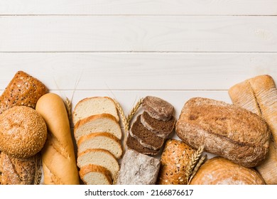 Homemade natural breads. Different kinds of fresh bread as background, top view with copy space. - Powered by Shutterstock