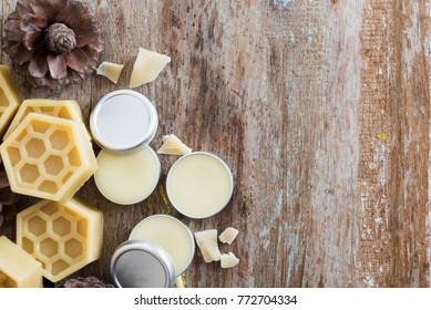 Homemade Natural Lip Balm On Wooden Table Background.