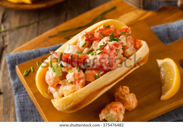 Homemade New England\
Lobster Roll with\
Lemons