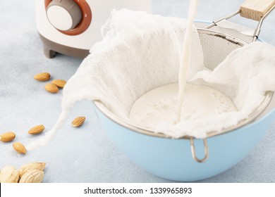 Homemade Nut Milk Making Process. Pouring Milk Into Cloth. Step By Step Recipe.