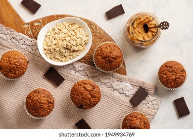 Homemade Oat Flakes Muffins With Peanut Butter And Chocolate.