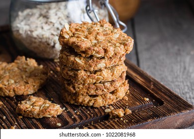 Homemade oatmeal cookies on wooden board on old table background. Healthy Food Snack Concept. Copy space/ - Powered by Shutterstock