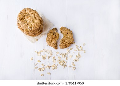 Homemade Oatmeal Cookies With Raisins And Chocolate On White Background. Healthy Snack Before Bedtime Or Nutritious Breakfast. Fresh Baked Wholegrain Cookies 