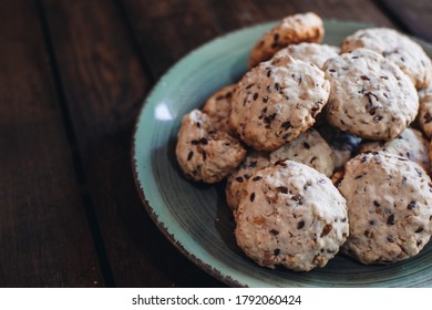 Homemade Oatmeal Raisin Cookies On Wood Background. Healthy Snack. Flaxseed Oatmeal Cookies.