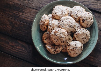 Homemade Oatmeal Raisin Cookies On Wood Background. Healthy Snack. Flaxseed Oatmeal Cookies.