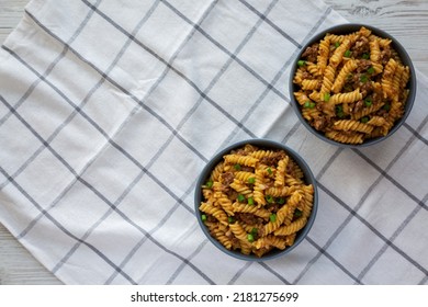 Homemade One-Pot Cheeseburger Pasta In Bowls, Top View. Flat Lay, Overhead, From Above. Copy Space.