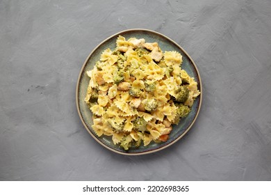 Homemade One-Pot Creamy Chicken And Broccoli Pasta On A Plate, Top View. Flat Lay, Overhead, From Above. 