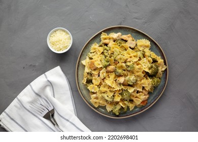 Homemade One-Pot Creamy Chicken And Broccoli Pasta On A Plate, Top View. Flat Lay, Overhead, From Above.