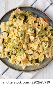 Homemade One-Pot Creamy Chicken And Broccoli Pasta On A Plate, Top View. Flat Lay, Overhead, From Above. 