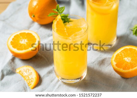 Homemade Orange Crush Cocktail with Mint and Vodka