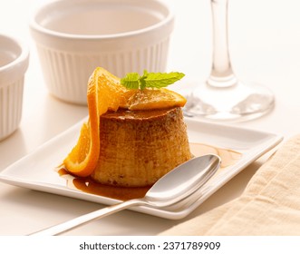 Homemade orange flan in one, a delicious dessert. Studio photography. - Powered by Shutterstock