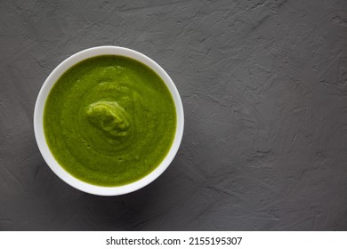 Homemade Organic Broccoli Soup On Gray Background, Top View. Flat Lay, Overhead, From Above. Copy Space.
