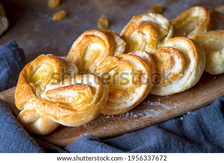 Homemade Palmier Puff Pastry. Delicious french palmier cookies with sugar. Palmiers, elephant ear, puff pastry cookie.